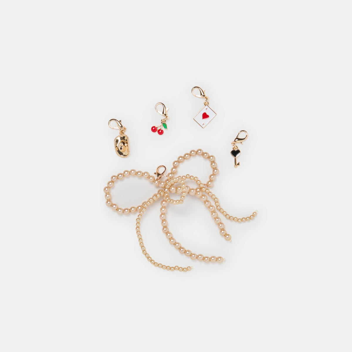 GOLD BOW CHARM PACKAGE ASSORTED